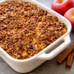 Apple Butter Pear Pecan Challah French Toast Bake with cinnamon and pecans on top.